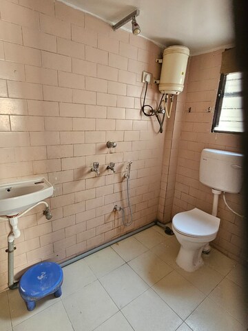 Bathroom in 2 BHK Apartment at Wadgaon Sheri – for Rent