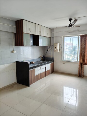 Kitchen in 1 BHK Apartment at Paranjape Schemes Richmond Park, Rahatani – for Rent