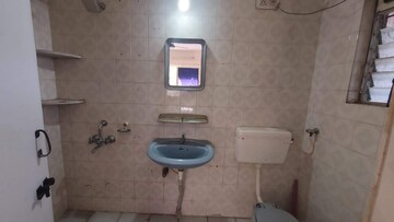 Bathroom in 1 BHK Apartment at Paranjape Schemes Richmond Park, Rahatani – for Rent