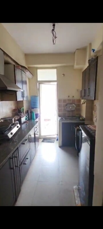 Kitchen in 2 BHK Apartment at Amrapali Empire, Sain Vihar – for Sale