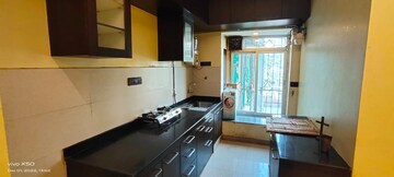 Kitchen in 2 BHK Apartment at Mantri Park, Goregaon East – for Rent