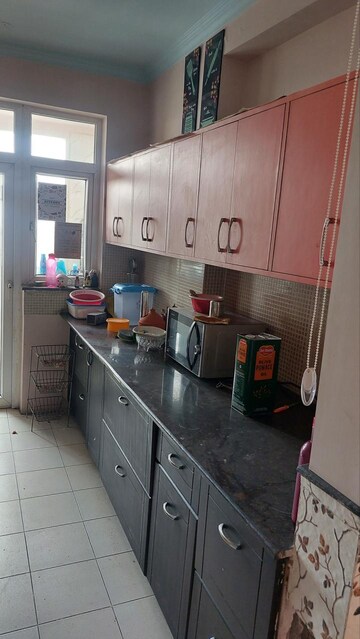 Kitchen in 3.5 BHK Apartment at Amrapali Silicon City, Sector 76 – for Rent