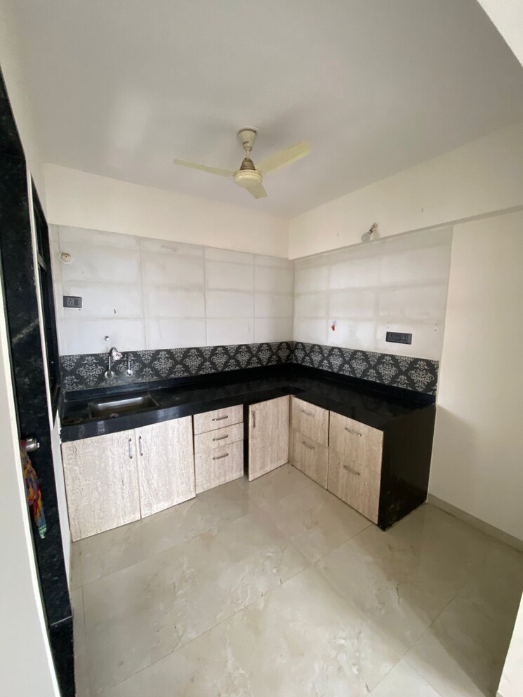 Kitchen, nyati-era 3 Bedroom 870 Sq.Ft. Apartment In Dhanori Pune 9090421
