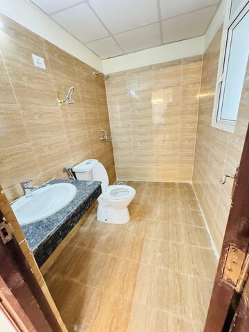 Kitchen in 3.5 BHK Apartment at Amrapali Crystal Homes, Sector 76 – for Rent