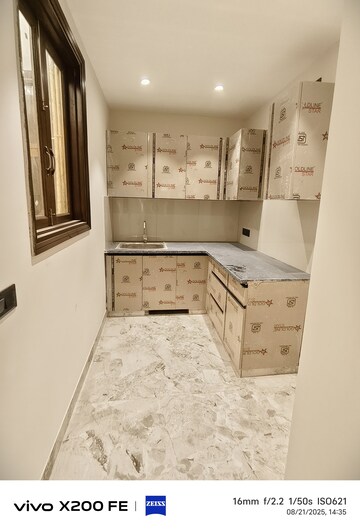 Kitchen in 2 BHK Builder Floor at Freedom Fighters Enclave – for Rent