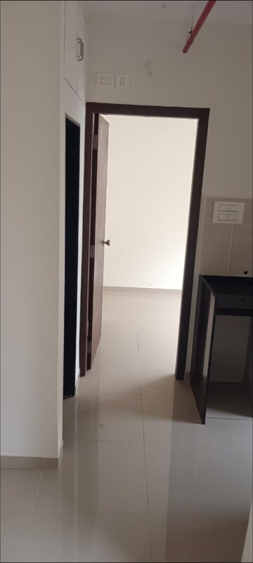 Living Room in 1 BHK Apartment at JP North Aviva, Mira Road – for Rent