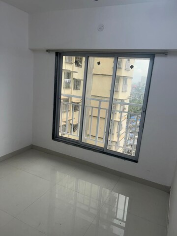 Living Room in 1 BHK Apartment at DGS Sheetal Tapovan, Malad East – for Rent