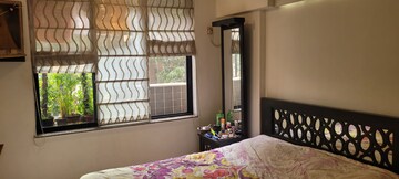 Bedroom in 2 BHK Apartment at Evershine Millennium Paradise, Kandivali East – for Rent