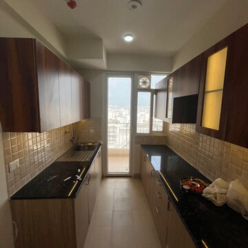 Kitchen in 3 BHK Apartment at Amrapali Crystal Homes, Sector 76 – for Rent