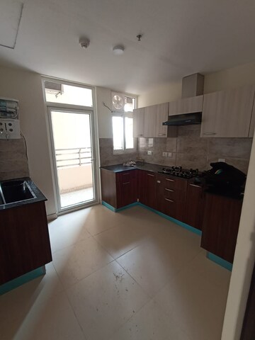 Kitchen in 2 BHK Apartment at Wave Amore, Sector 32 – for Rent
