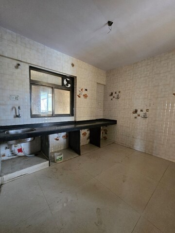 Kitchen in 2 BHK Apartment at Kharigaon – for Sale