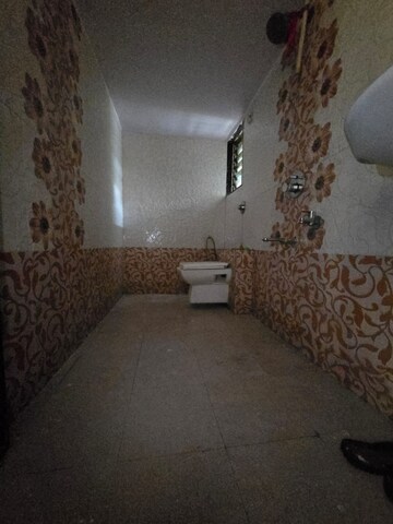 Bathroom in 2 BHK Apartment at Kharigaon – for Sale