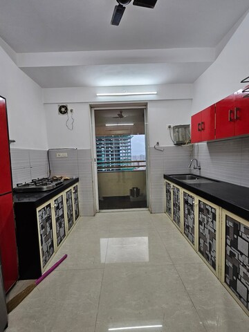 Kitchen in 2 BHK Apartment at Ekta Meadows, Borivali East – for Rent