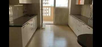 Kitchen in 4 BHK Apartment at Purvanchal Royal City, Chi V Greater Noida – for Sale