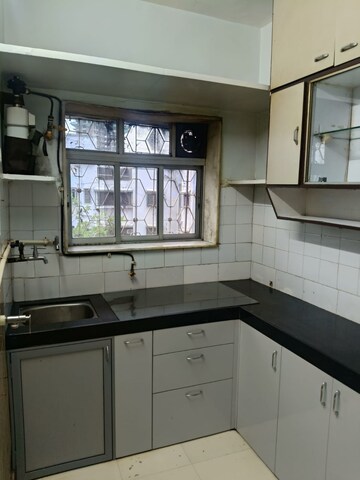 Kitchen in 1 BHK Apartment at Deepmala CHS, Andheri West – for Rent