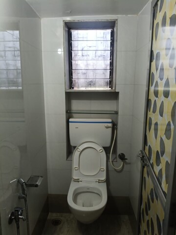 Bathroom in 1 BHK Apartment at Deepmala CHS, Andheri West – for Rent