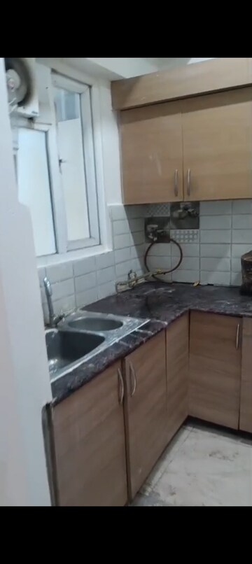 Kitchen in 2 BHK Apartment at Gaur City 2 - 14th Avenue, Sector 16c Greater Noida – for Rent
