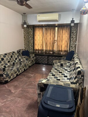 Living Room in 1 BHK Apartment at Evershine Millennium Paradise, Kandivali East – for Sale