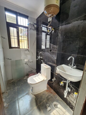 Bathroom in 2 BHK Builder Floor at Chattarpur – for Rent