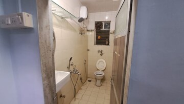 Bathroom in 2 BHK Apartment at Crystal Garden Estate CHS, Manpada – for Rent
