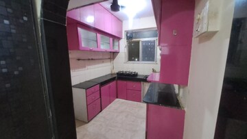 Kitchen in 2 BHK Apartment at Crystal Garden Estate CHS, Manpada – for Rent