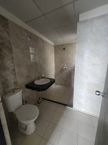 Bathroom in 4 BHK Apartment at Landcraft Golf Links, Pandav Nagar – for Sale