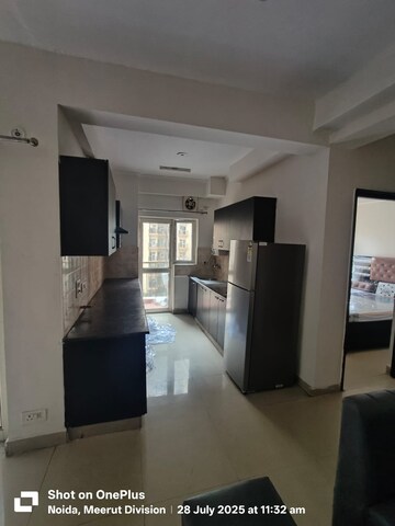 Kitchen in 2.5 BHK Apartment at Aims Golf City, Sector 75 – for Rent