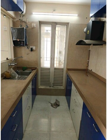 Kitchen in 2 BHK Apartment at Dosti Oak, Kolshet Industrial Area – for Rent