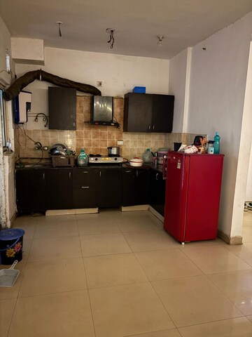 Kitchen in 2.5 BHK Apartment at Aims Golf City, Sector 75 – for Rent