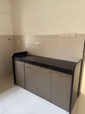 Kitchen in 3 BHK Apartment at Acme Ozone, Manpada – for Rent