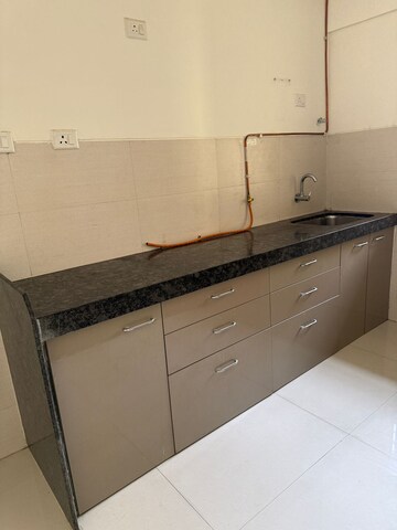 Kitchen in 3 BHK Apartment at Acme Ozone, Manpada – for Rent