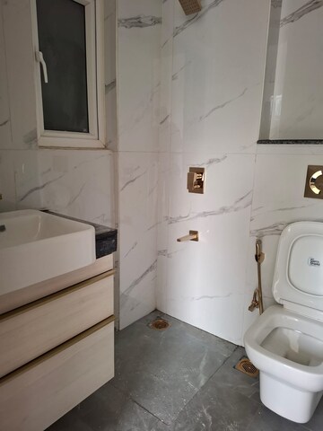 Bathroom in 3 BHK Apartment at Smart World Orchard, Sector 61 – for Rent