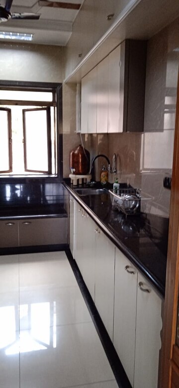 Kitchen in 2 BHK Apartment at Aditya Apartment, Andheri West – for Sale