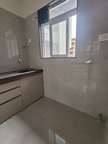 Kitchen in 2 BHK Apartment at Laxmi Vishwa Vihang Heights, Dahisar East – for Rent