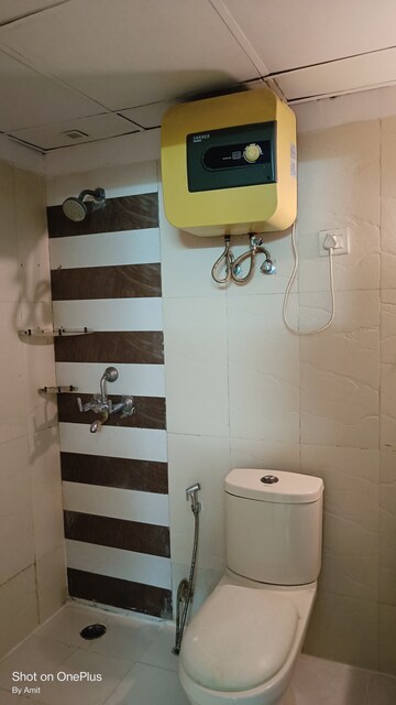 Bathroom in 2 BHK Apartment at Amrapali Eden Park, Sector 50 – for Rent