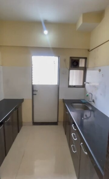 Kitchen in 2 BHK Apartment at Raunak Unnathi Gardens, Pokhran Road No One – for Rent