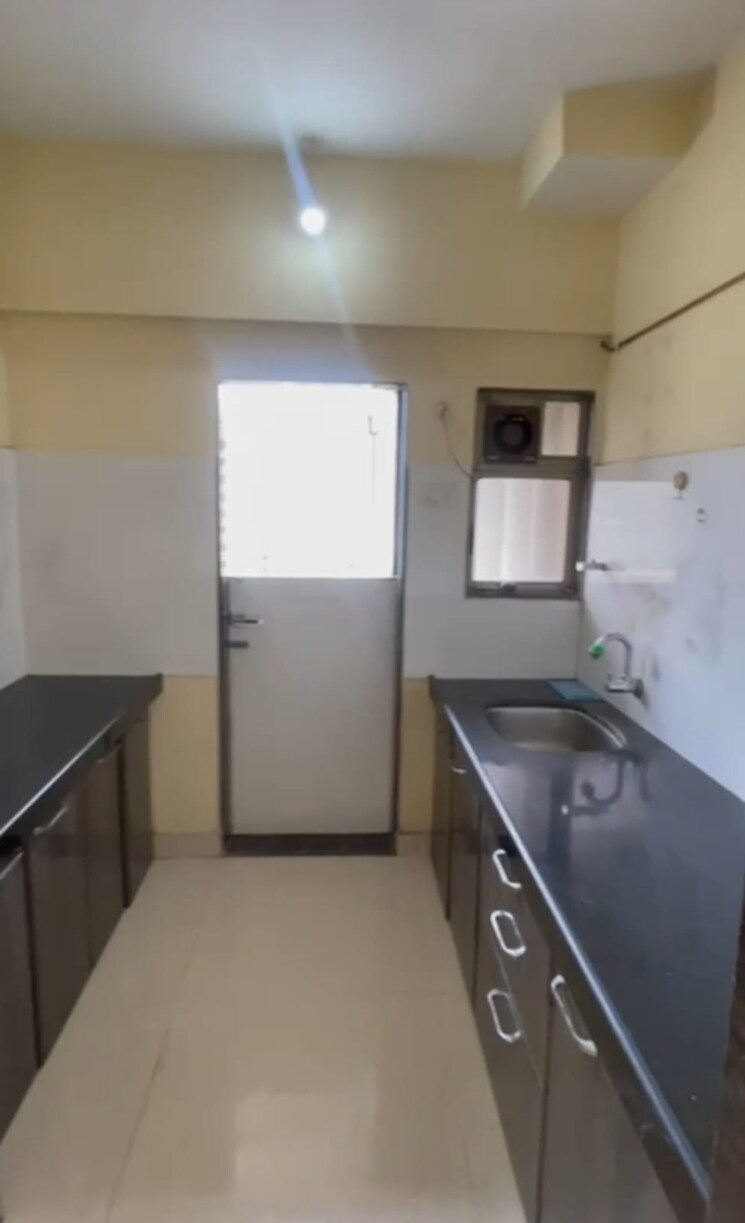 Kitchen, raunak-unnathi-gardens 2 Bedroom 1045 Sq.Ft. Apartment In Pokhran Road No One Thane 9091238