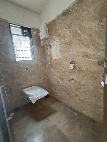 Bathroom in 1 BHK Apartment at Dinaco Darshan CHS, Dahisar West – for Rent