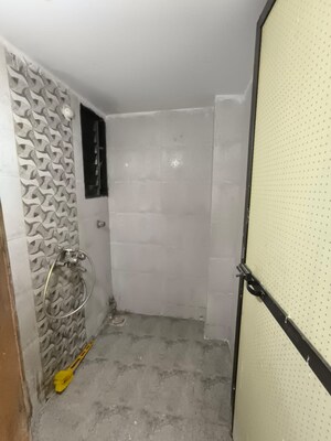 Bathroom in 1 BHK Apartment at Dharti Orange Heights, Morya Nagar – for Sale