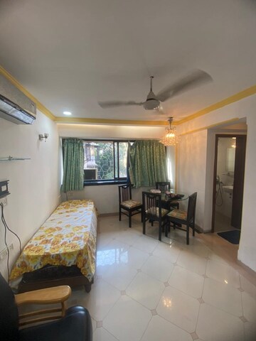Living Room in 1 BHK Apartment at Bandra West – for Rent