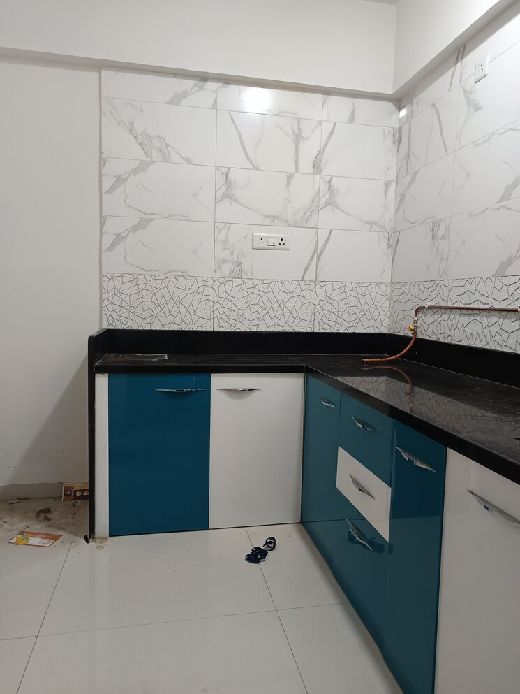 Kitchen, nirmiti-25-east 2 Bedroom 750 Sq.Ft. Apartment In Kharadi Pune 9091484