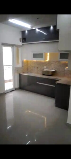 Kitchen in 3 BHK Apartment at VIctoryone Amara, Sector 16 Greater Noida – for Sale