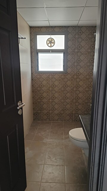 Bathroom in 3 BHK Apartment at Sobha Palm Courts, Kogilu – for Rent