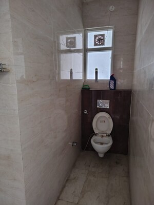 Bathroom in 3 BHK Builder Floor at Dhakoli – for Sale
