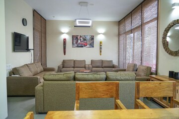 Living Room in 4 BHK Apartment at Shela – for Rent
