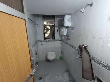 Bathroom in 2 BHK Apartment at Abhishek Complex, Malad West – for Rent