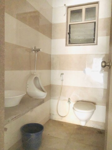 Bathroom in  Office Space at Sheladia One World West, Ambli – for Rent