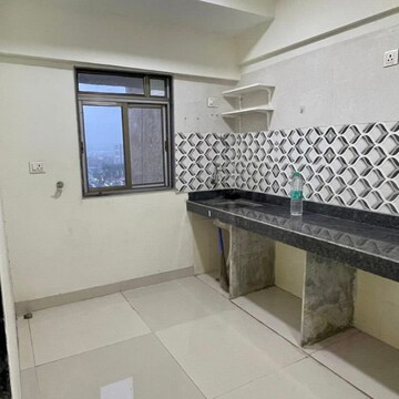 Kitchen in 1 BHK Apartment at Dev Leo Tower, Adarsh Nagar – for Rent
