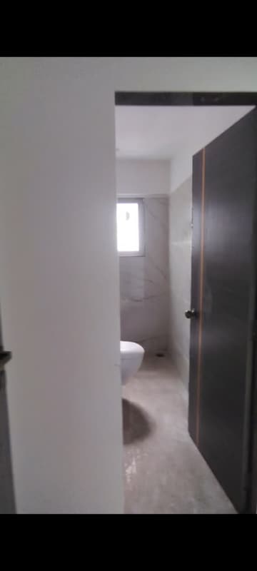 Bathroom in 2 BHK Apartment at Sandhya Eve Horizon, Kandivali West – for Rent