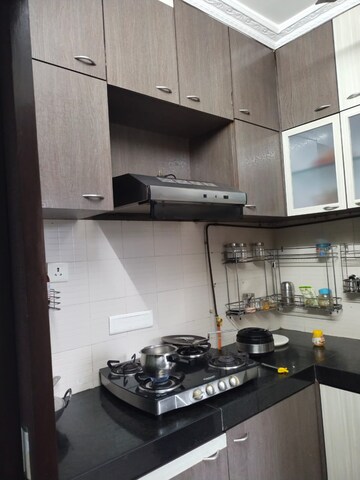 Kitchen in 1 BHK Apartment at Pushpanjali Heights, Owale – for Rent